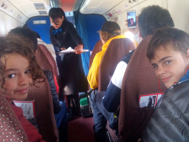 kids on a plane kids from world travel family travel blog