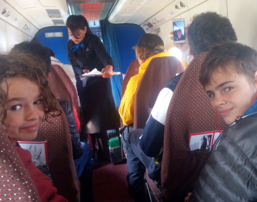 kids on a plane kids from world travel family travel blog