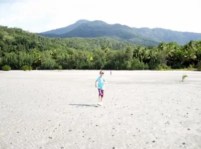 Rainforest meeting a beautiful beach, the reef is neaby