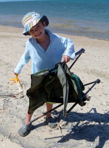 Beach Cleaning Volunteer near Cairns Port Douglas Great Barrier Reef Snapper Island