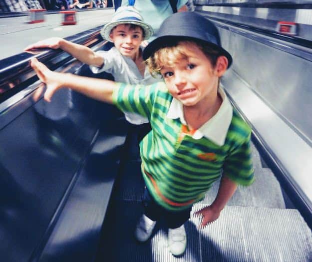 London with children riding the tube