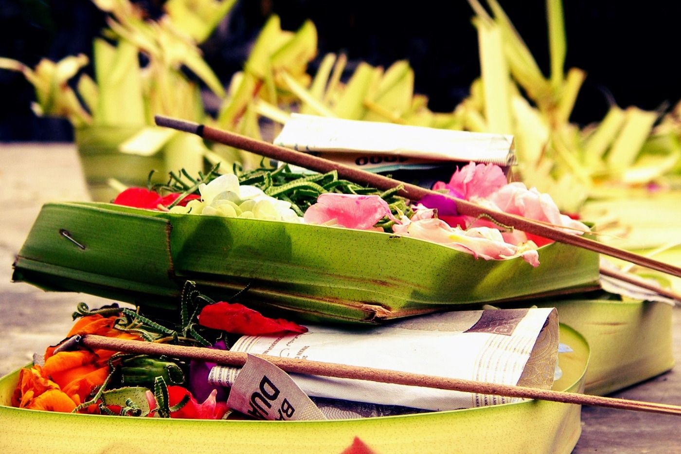 offerings of flowers, incense and cash, on the streets of Ubud Bali