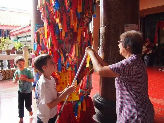 Kek Lok Si temple. Hanging a prayer.