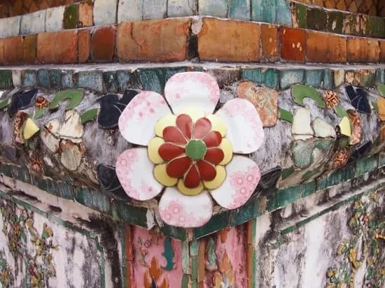 sea shalls and broken china decorate wat arun bangkok