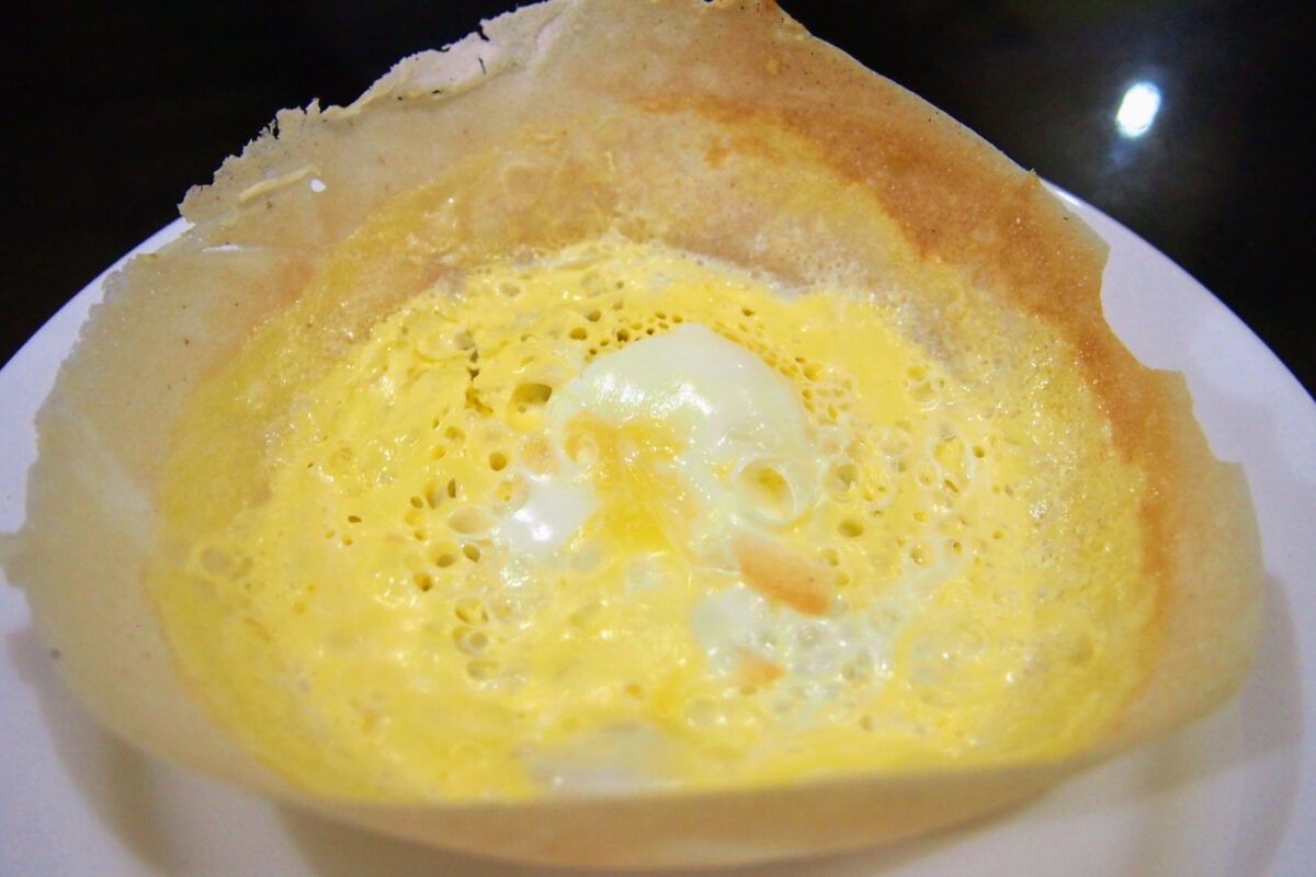 an egg hopper, a pancake containing egg