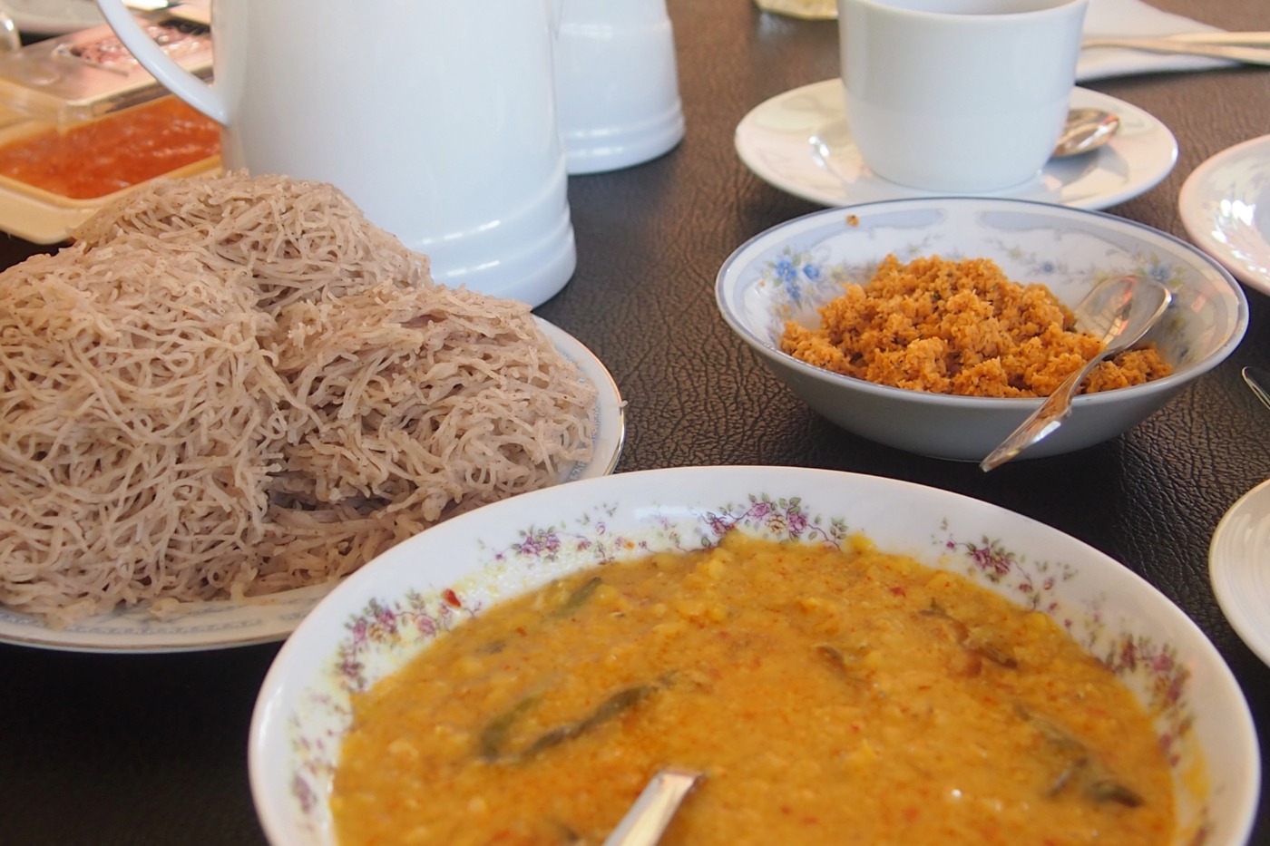 string hoppers served with curry and chutney