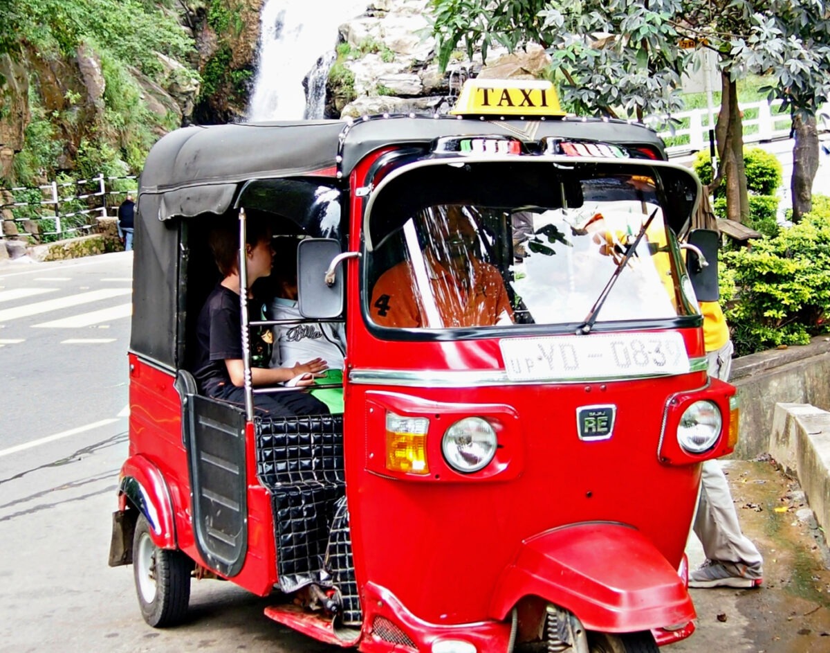 children in a tuk tuk at Ella waterfalls