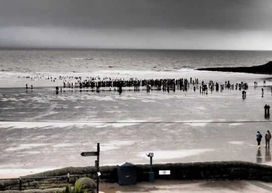 Barry Island Wales. Swimming on the beach New Year's Day