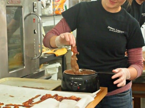 Dipping the chocolate bacon