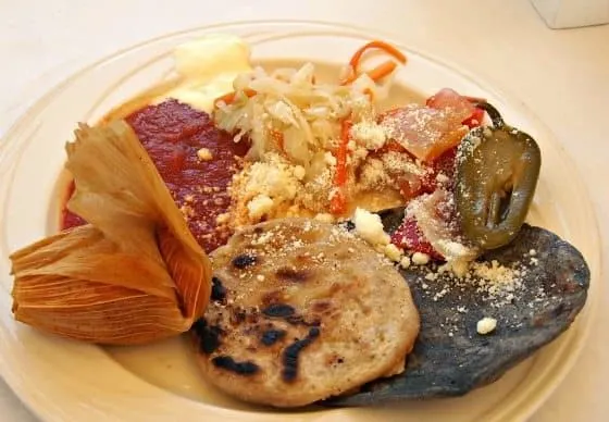 Breakfast in El Salvador. Pupusas, black tortillas, enchiladas and pickles