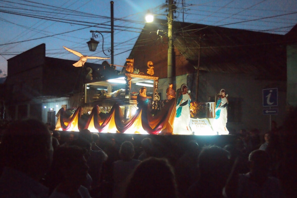 Jesus being carried around flores by the procession