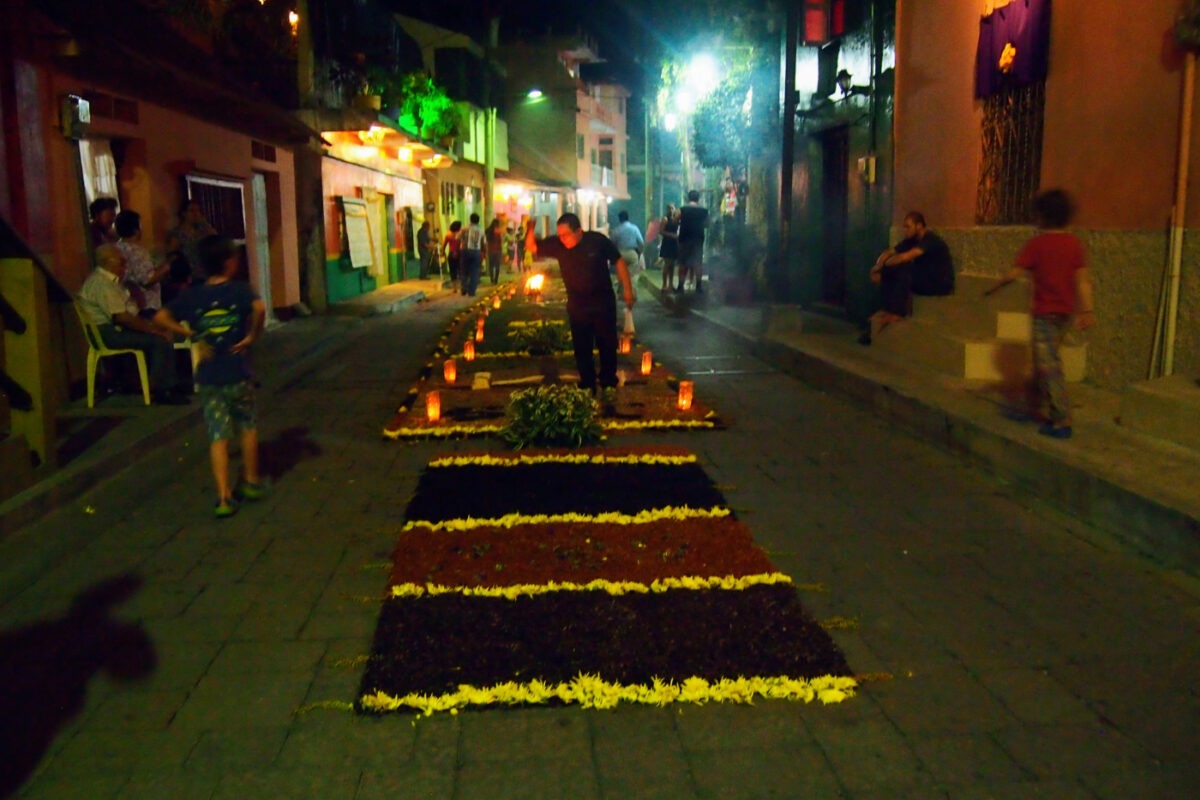 Flower carpets in the streets at night before the Easter Parade in Flores