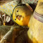 reclining golden Buddha inside the Dambulla Cave Temples in Sri Lanka