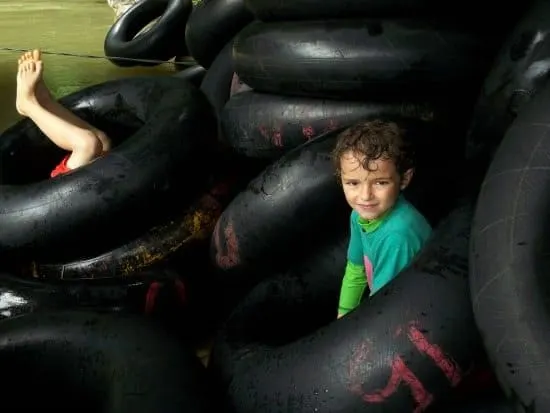 Fun with kids tubing vang vieng at water cave kayaking in Vang Vieng