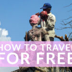 Man working How to travel the for free guide