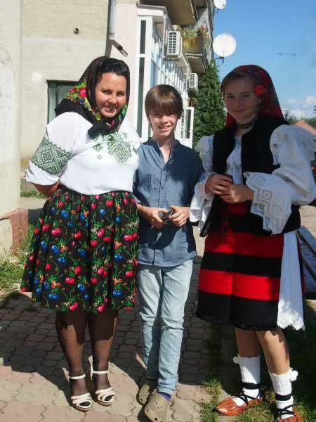 Village life in Romania. Traditional Maramures outfits are still part of life in rural Romania.