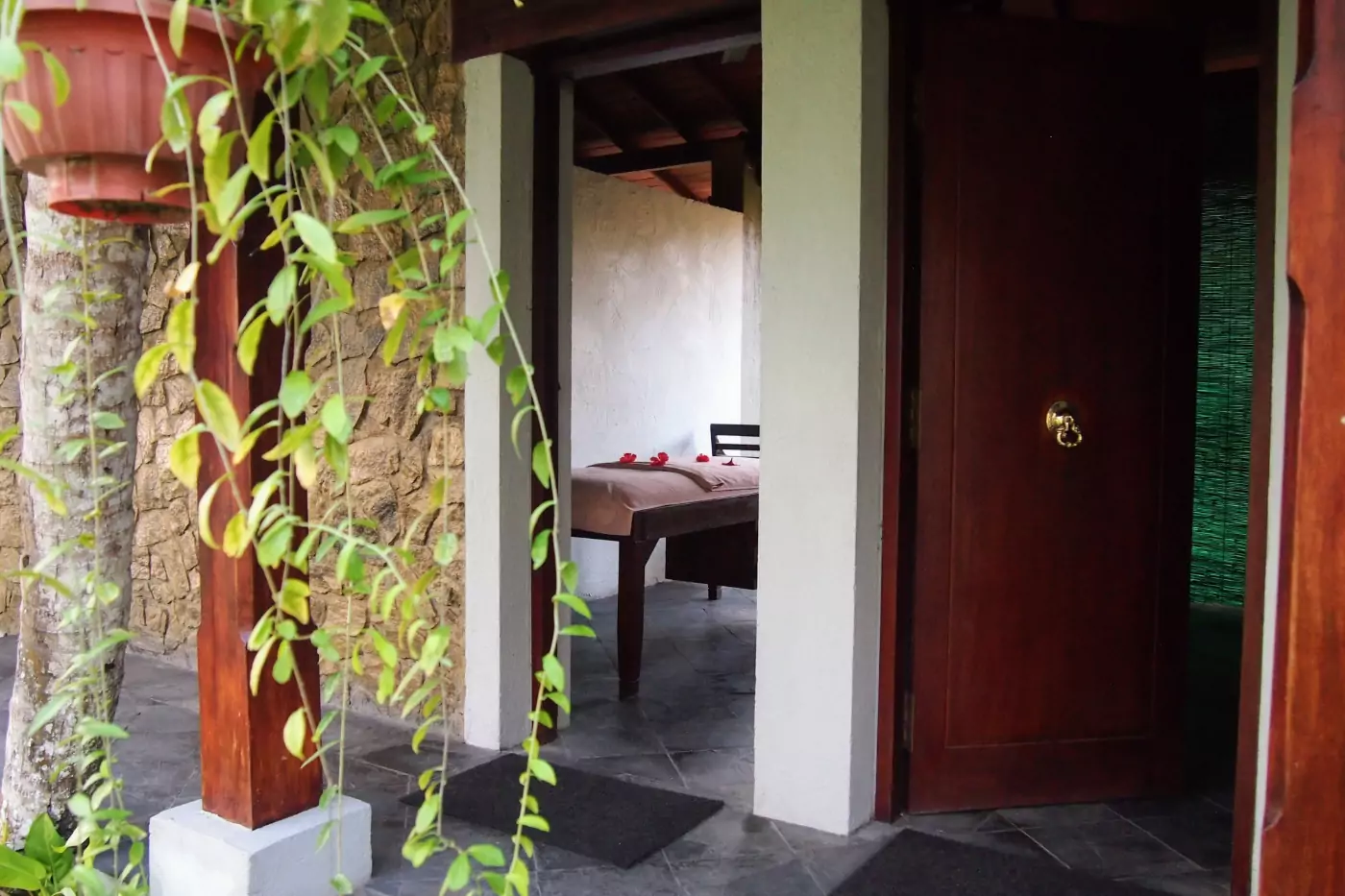 The spa at the Occidental eden Beruwala or Beruwela with red hibiscus flowers on the massage bed