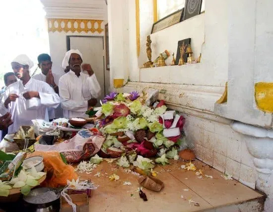 Visiting Anurahadapura, ancient cities of Sri Lanka. The sacred Bo Tree of Buddha. Offerrings at the Temple