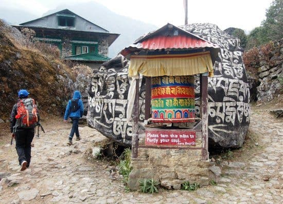 Nepal with kids, trekking with kids. Cultural enlightenment near Everest. Prayer wheels and learning about religion and spirituality with the Sherpa people