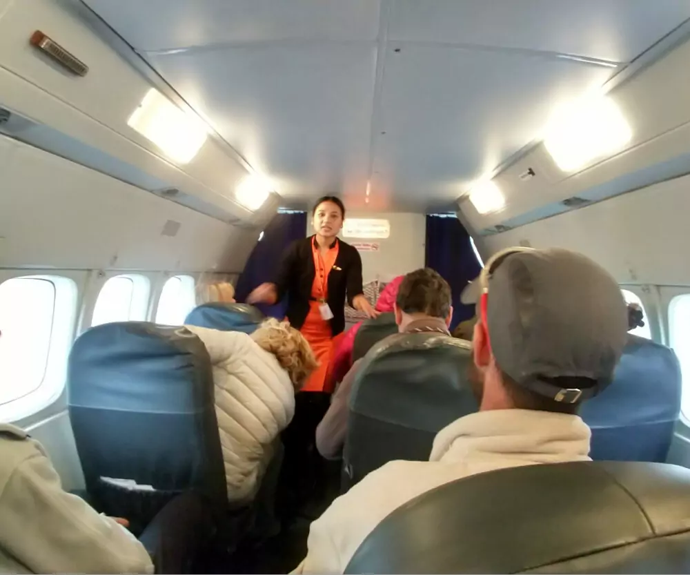 Kathmandu to Lukla flight attendant gives safety briefing