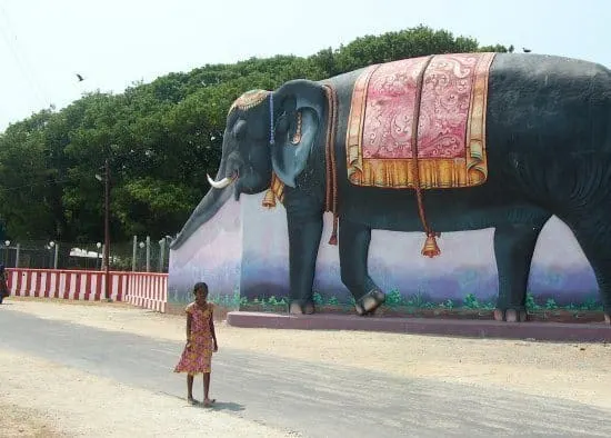 THings to do in Jaffna. A giant elephant and a small girl. Jaffna's island temples. 