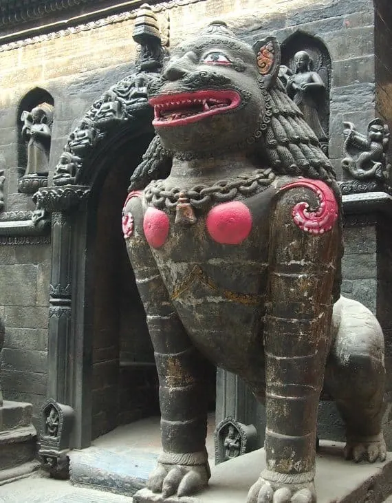 Alarming-pink-breasts.-The-Golden-Temple.-Lighting-Candles-Patan-Durbar-Square-Kathmandu-Nepal.jpg
