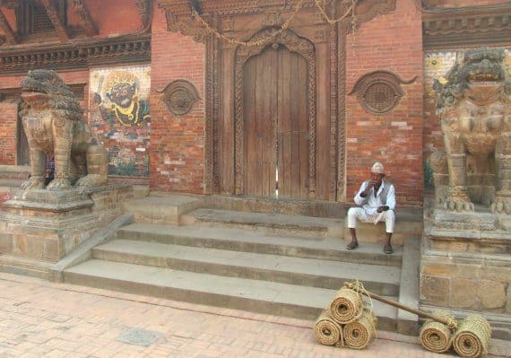 Entrails-The-Golden-Temple.-Lighting-Candles-Patan-Durbar-Square-Kathmandu-Nepal