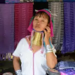 Long Neck Woman Brass Rings around her neck in a Hill Tribe village in north Thailand