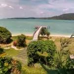 telunas resort private island jetty and sea