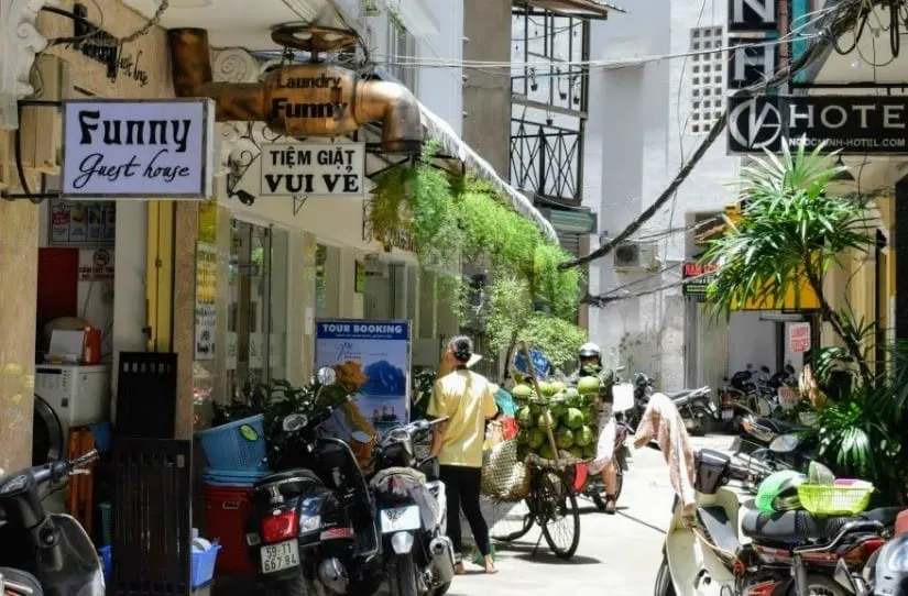 Family accommodation in south east asia, alleyway in saigon filled with hotels and guest houses