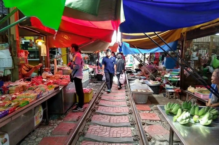 Maeklong Railway Market between trains