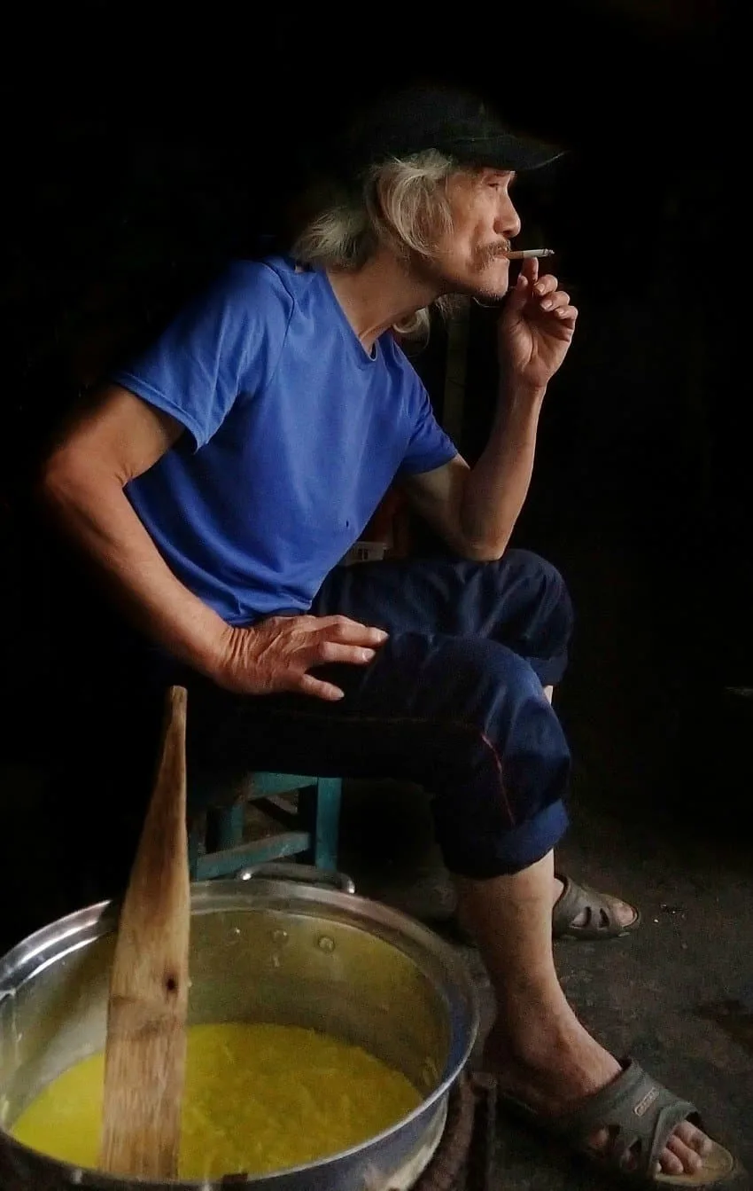 Vietnam best photo tour hoi an Photo of man smoking cigarette