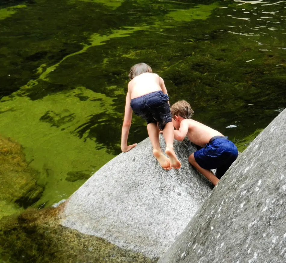 Australia is the perfect place to swim in a ffesh water stream. My kids, co creators of this Australia travel blog