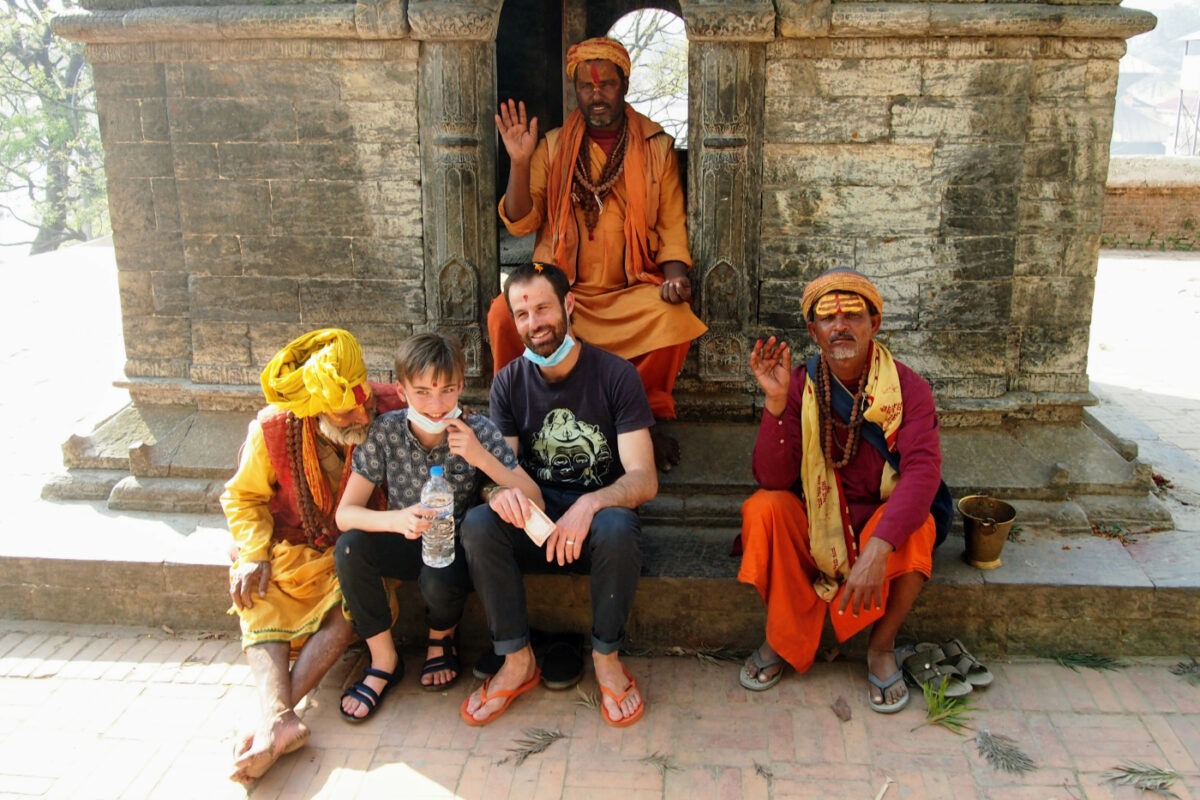 Kathmandu, family, Dad, son, with holy men.