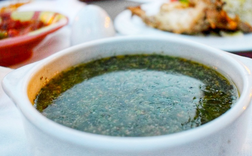 A bowl of Mulukhiya Green slime soup Egypt Food in Egypt