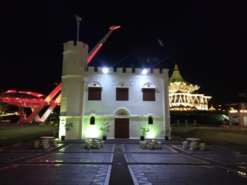 The square tower kuching lit up at night