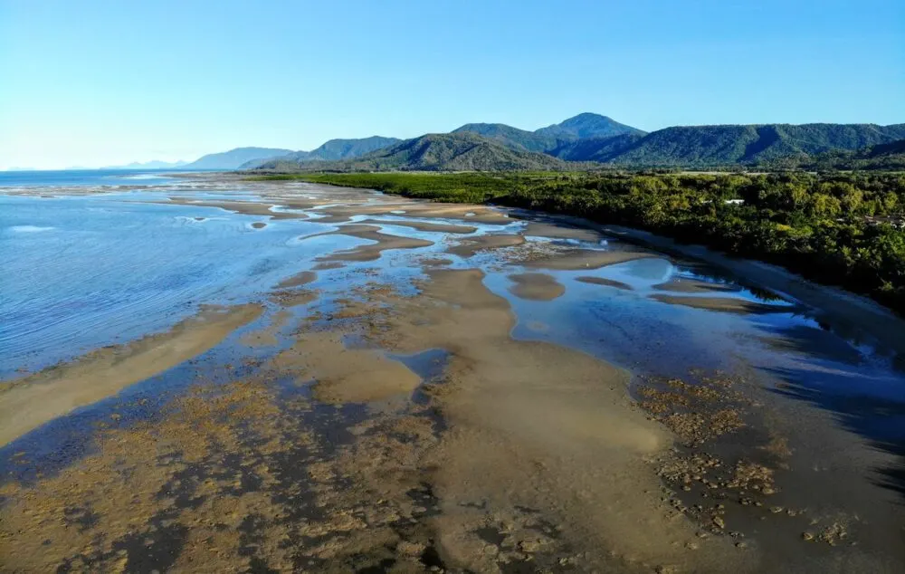 Low tide drone shot four mile beach port douglas