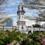 ipoh malaysia pretty white clock tower and flowers