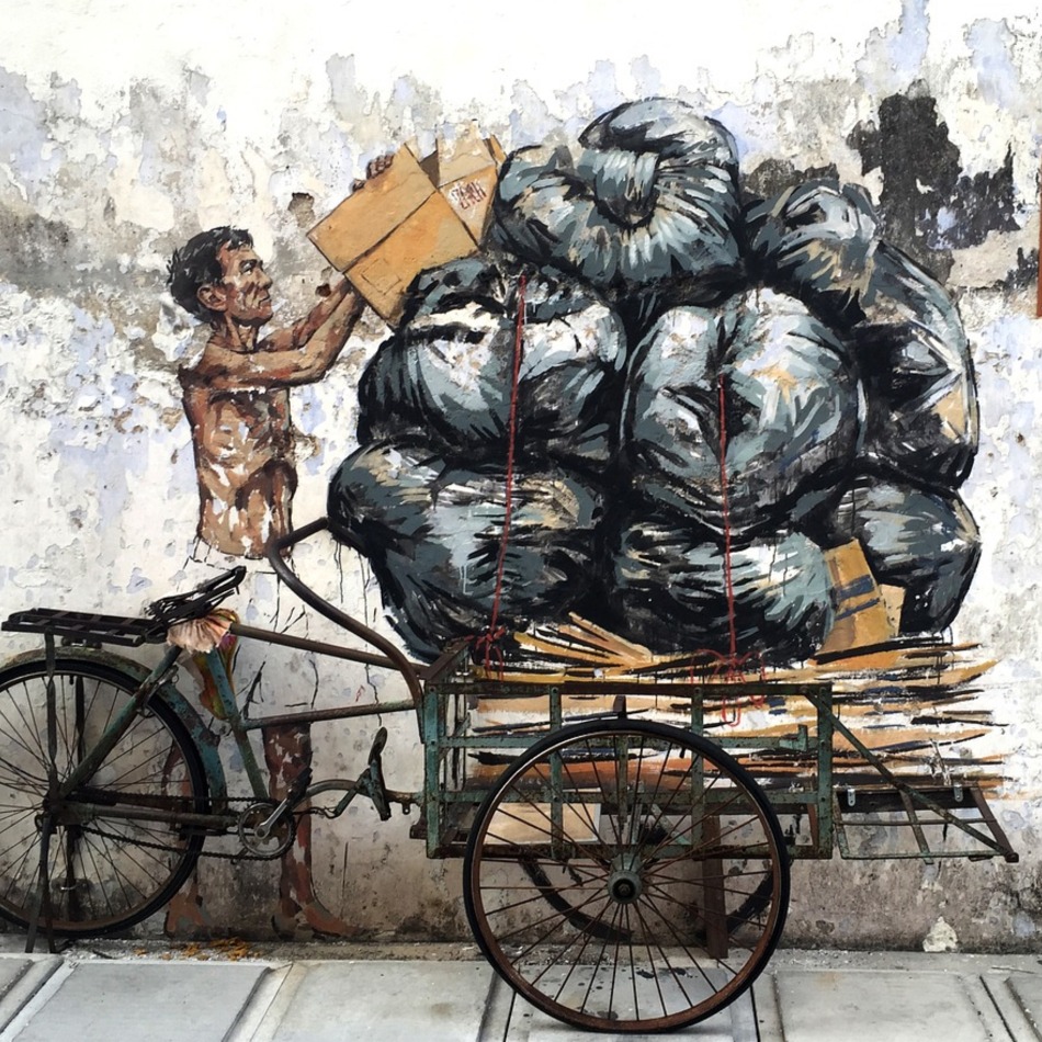 怡保老城区男子清洁的街头艺术