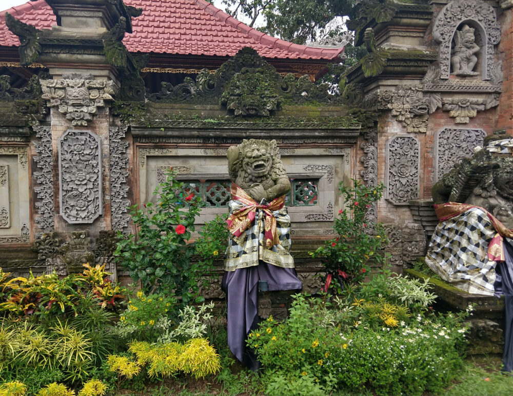 Bali  typical gardens and statues, architecture.