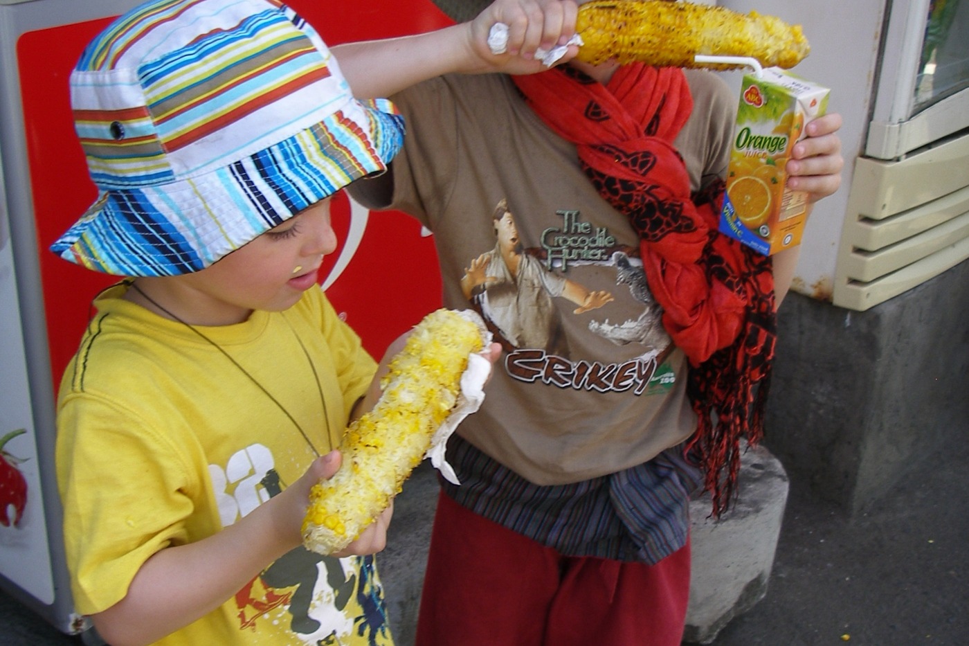 children eating street food