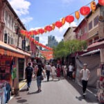 Street scene with shops and lanterns in Chinatown Singapore