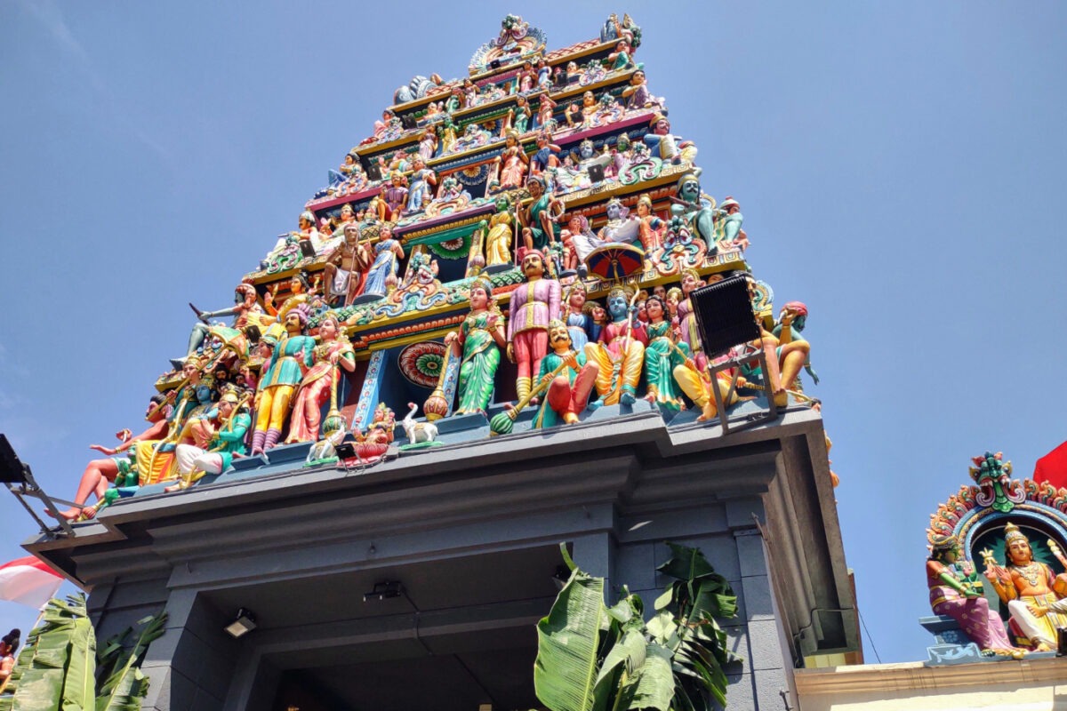 Ornate gopuram decorated with sculpures of gods at Sri Mariamman Temple Chinatown.