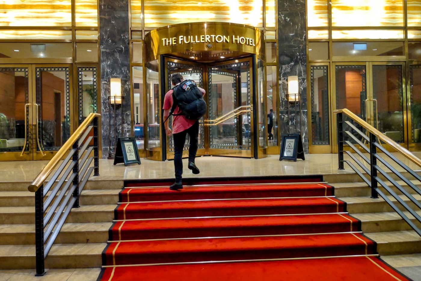 Fullerton hotel entrance steps, my son and his backpack.