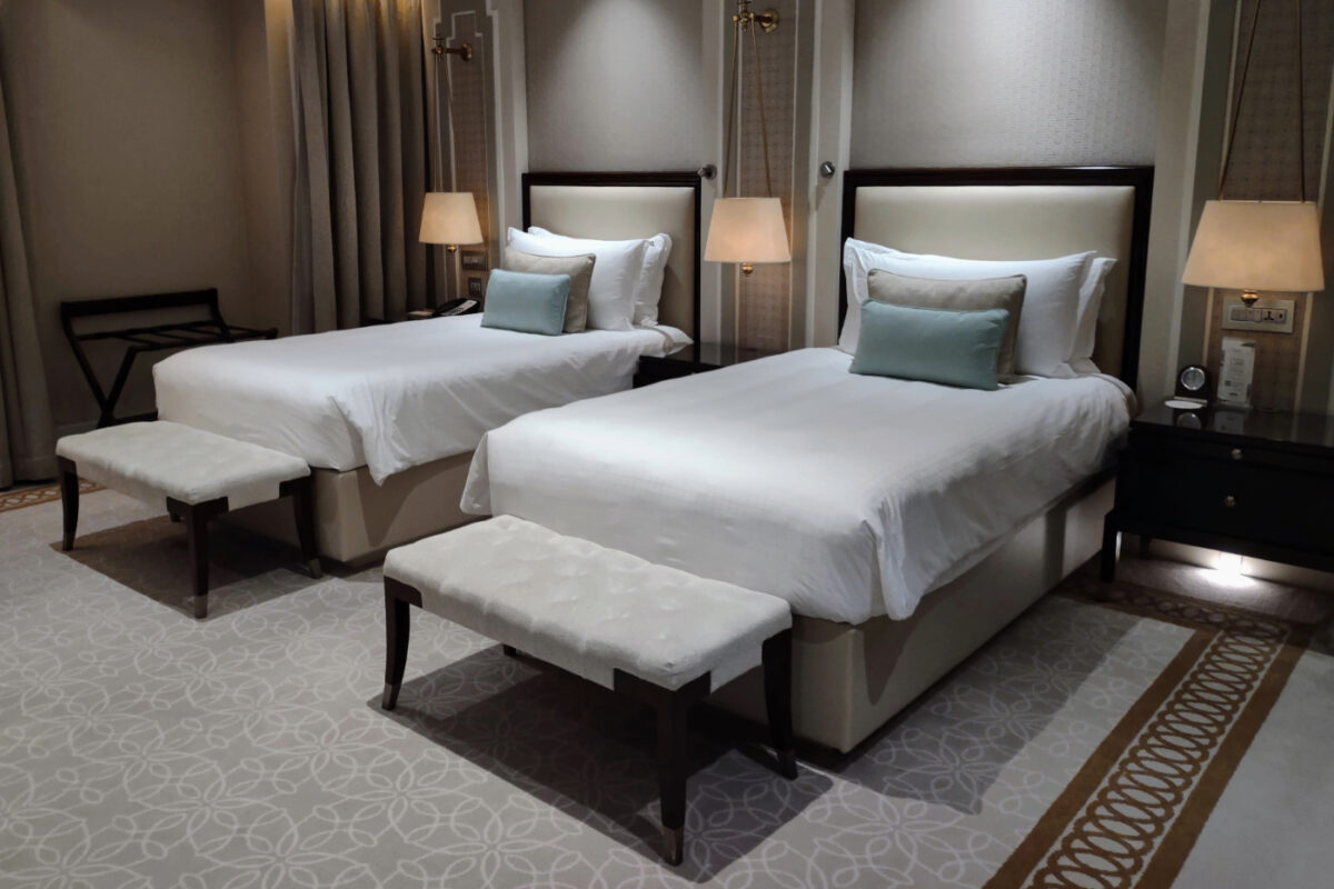 Twin room, 2 single beds, at The Fullerton Hotel Singapore.