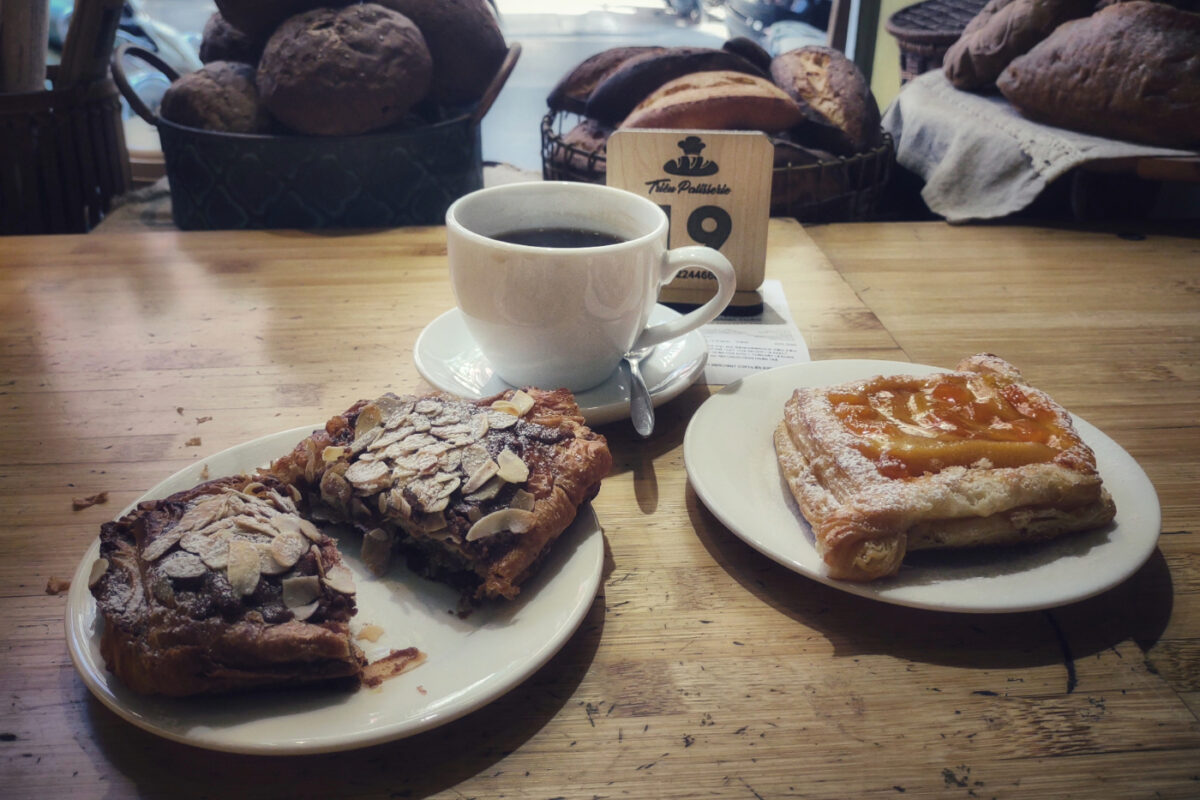 Chocolate croissant, apricat pastry and coffee at a great patisserie in Hanoi