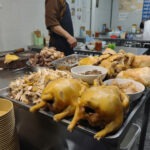 Michelin Guide street food Hanoi, braised chickens on the street.