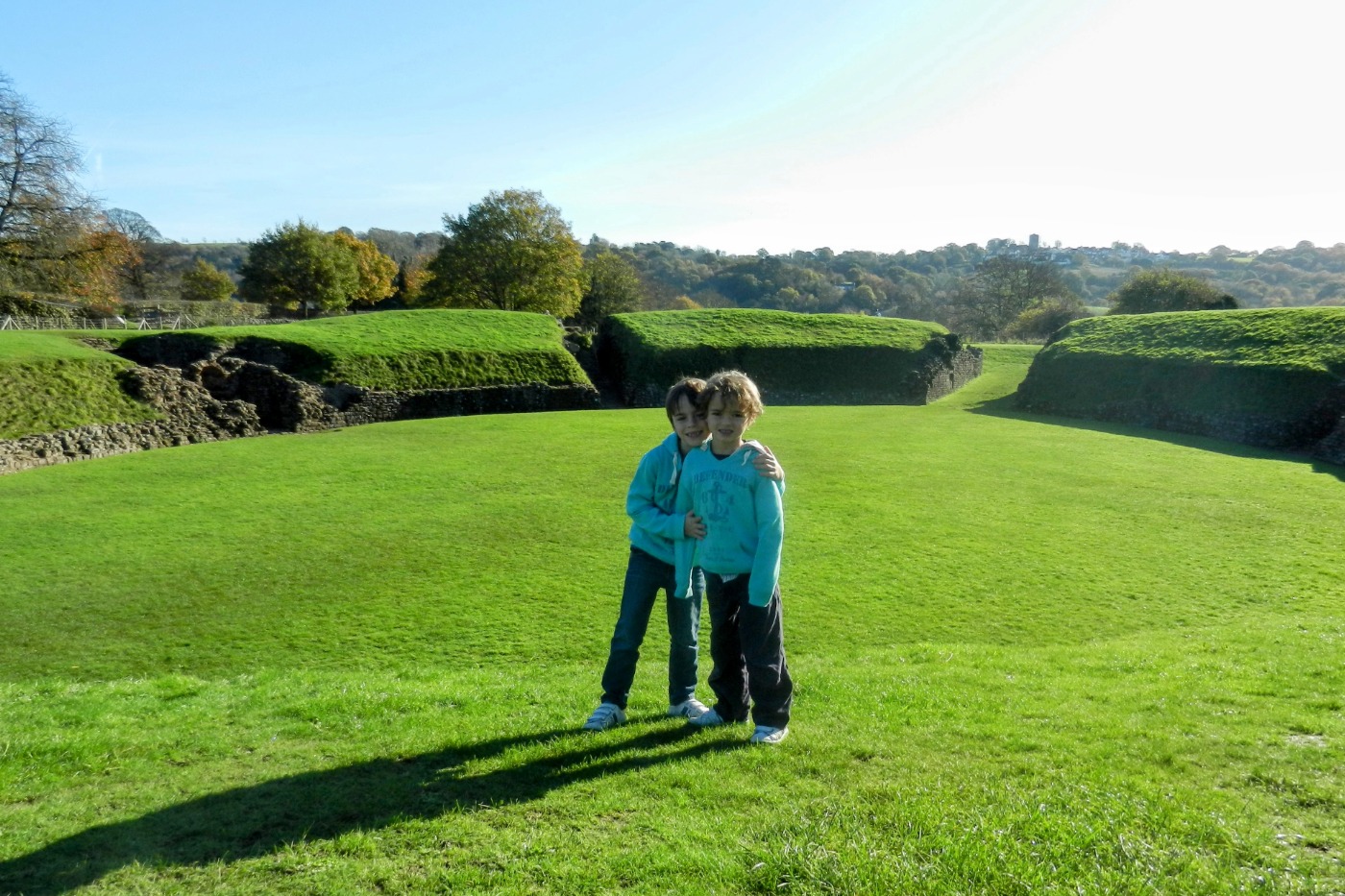 Small children at the Roman amphitheatre in Caerleon South Wales