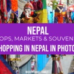 a gift shop on a street in Kathmandu selling traditional Nepali dolls and prayer flags