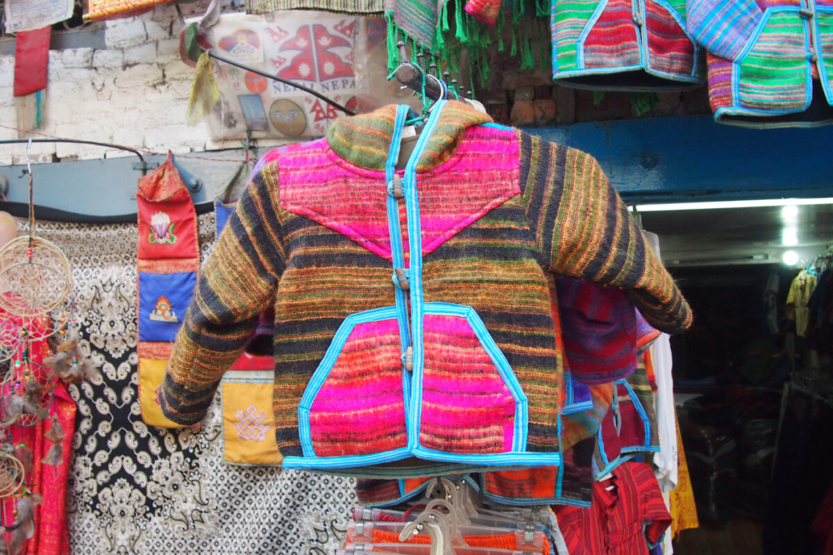 Shopping for kids clothes in Nepal warm colourful wool coat
